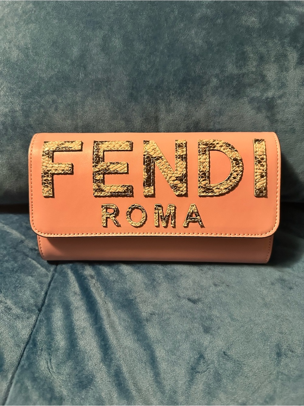 Fendi Coral Pink Leather Clutch with Textured Logo
